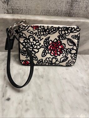 Coach Black White and pink poppy Floral Wristlet